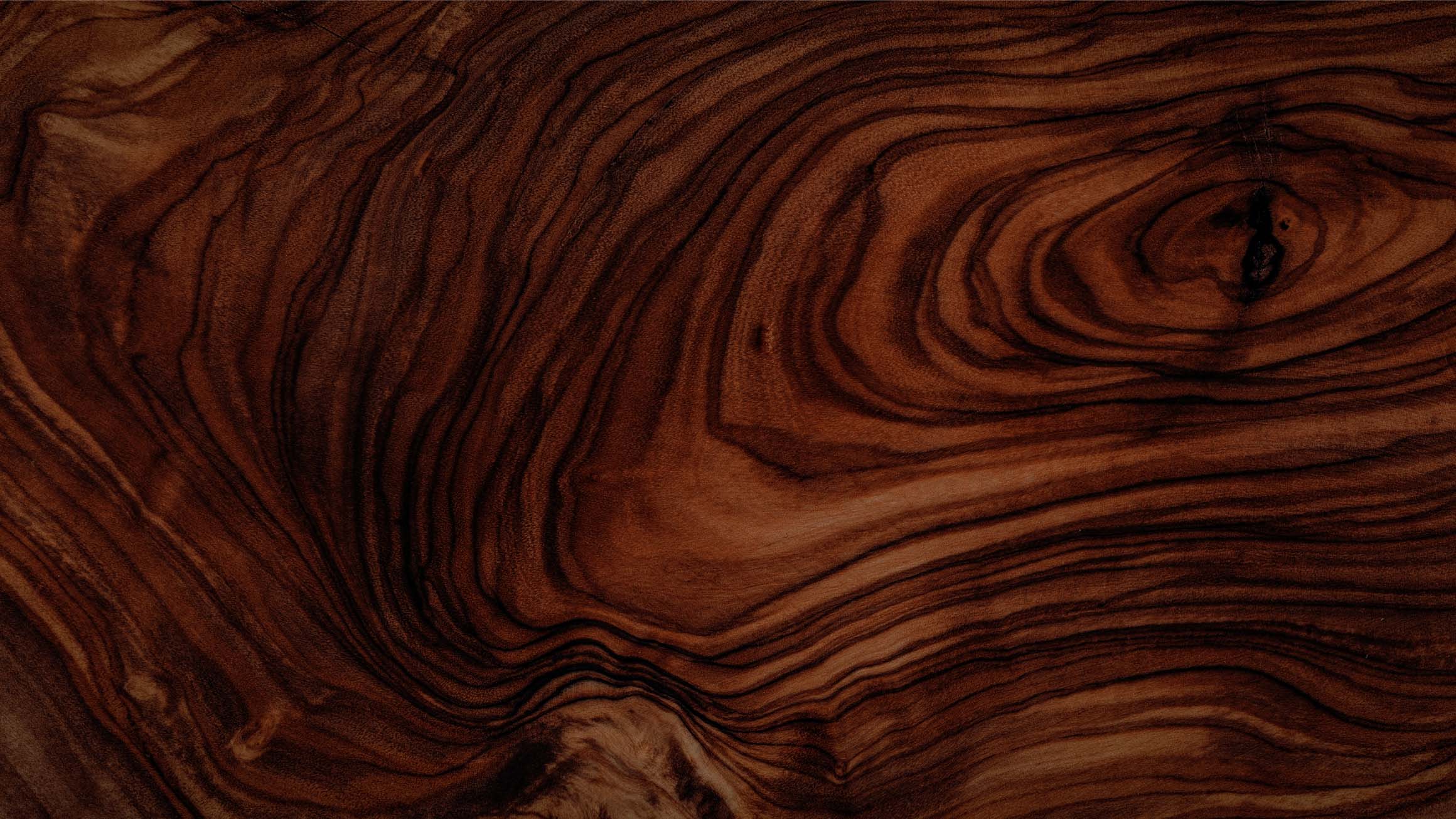 Close-up of a wooden surface with visible grain and texture