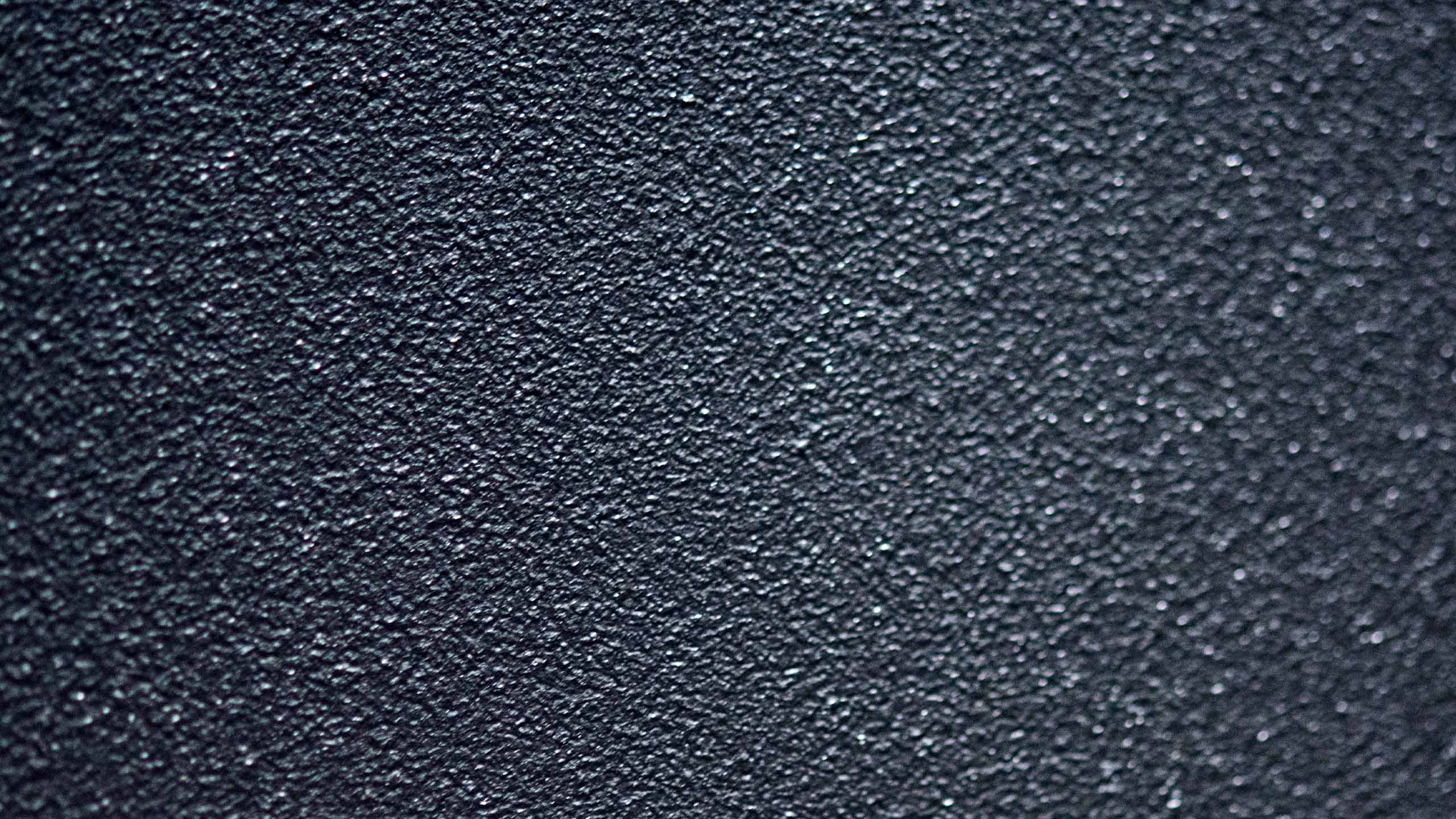 Close-up of a textured dark blue surface